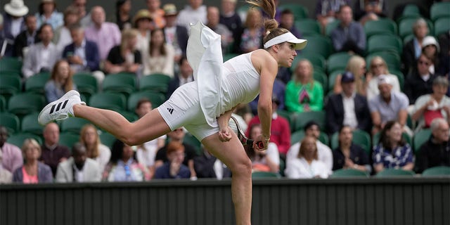 Elina Svitolina serves ball