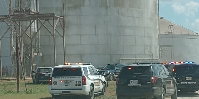 Authorities near ruptured grain elevators