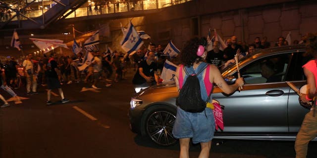 Car in Israeli protest