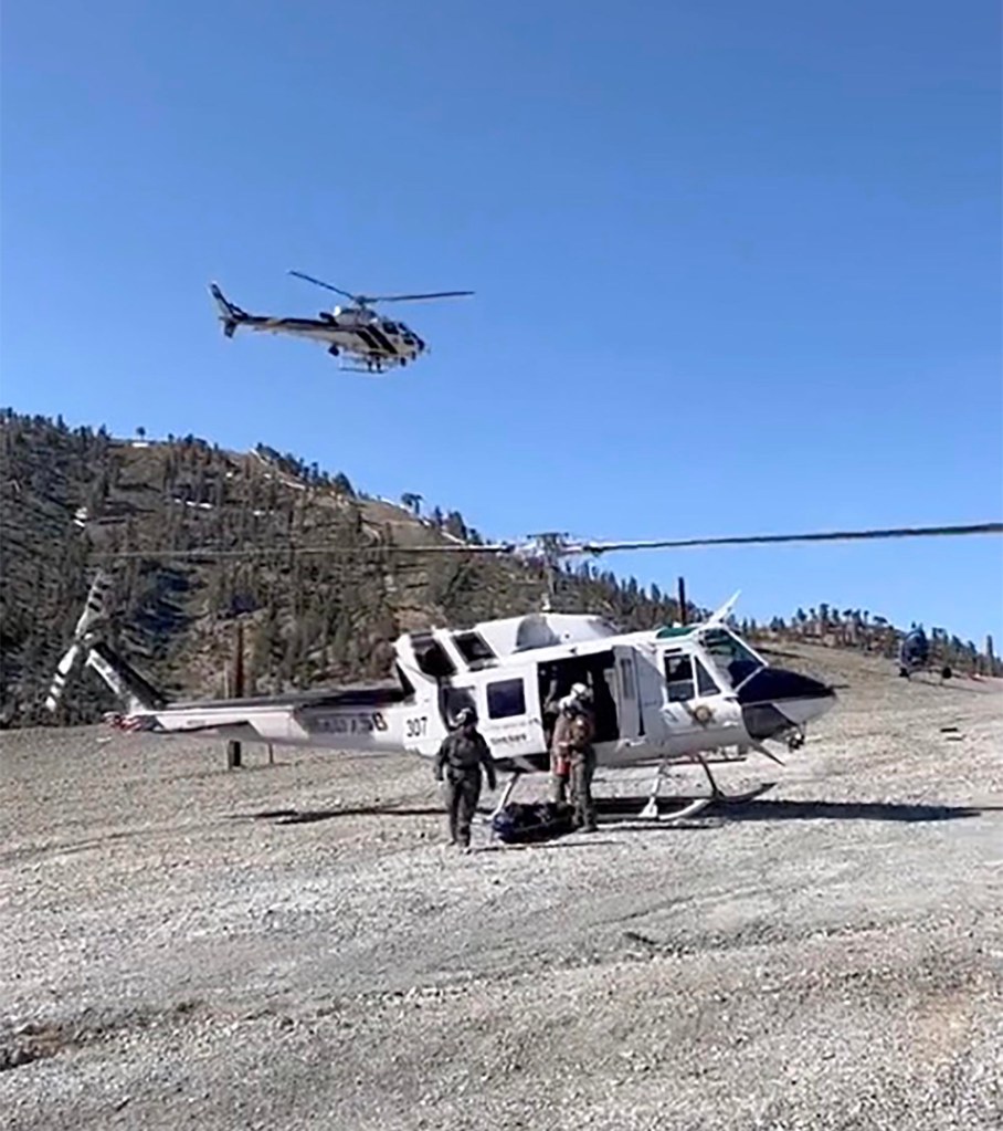 Helicopters belong to the San Bernardino County Sheriff Department during their search for Sands.