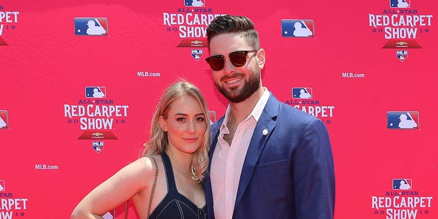 Lucas Giolito poses with his wife at the MLB Red Carpet Show in 2019