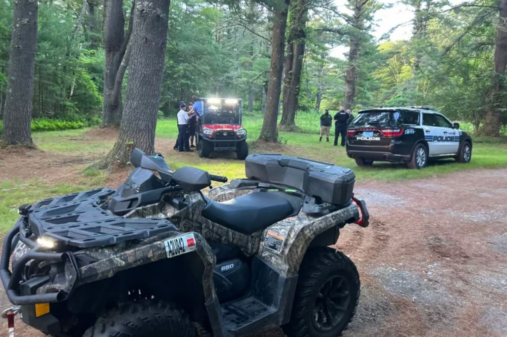 Three cops on ATVs navigated through the area until they found Emma Tetewsky trapped in the muddy area. 