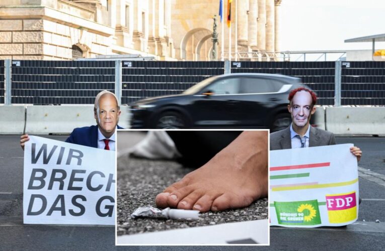 German trucker rams into climate protester blocking intersection, drags him to side of road