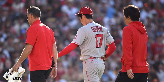 Ohtani leaves with trainer