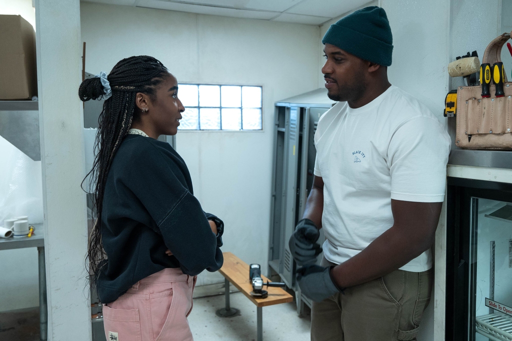 Sydney and Marcus (Lionel Boyce) share a moment amidst the chaos of rebuilding the restaurant.