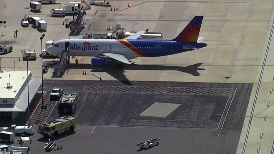 Allegiant air plane sitting at the airport