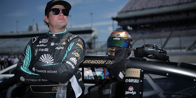 Noah Gragson waits on the grid