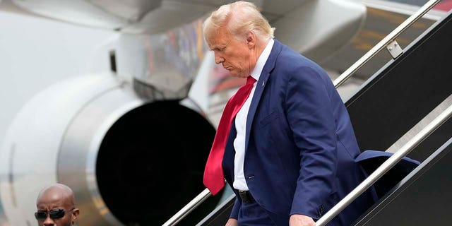 Former President Donald Trump arrives at Ronald Reagan Washington National Airport