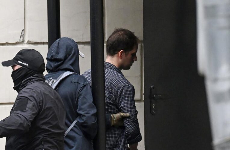 Jailed WSJ reporter Evan Gershkovich arrives at a hearing on extending his detention