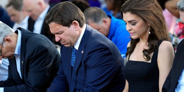 Ron and Casey DeSantis pray at Jacksonville vigil