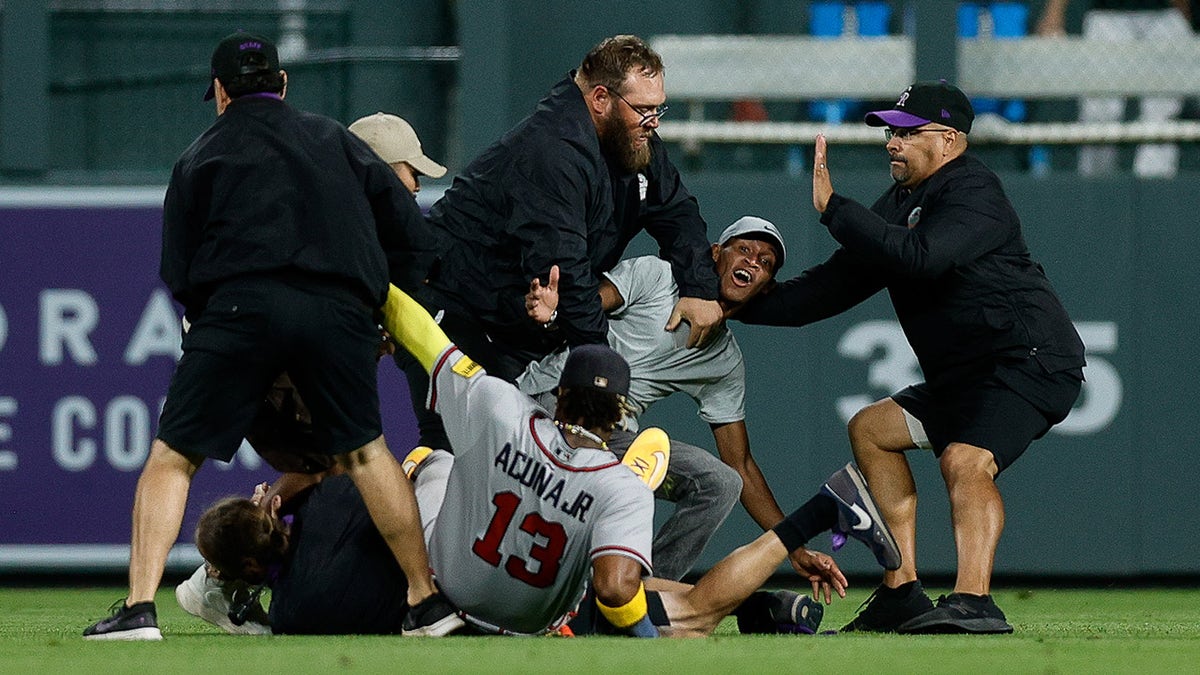 Ronald Acuña Jr. falls amid skirmish