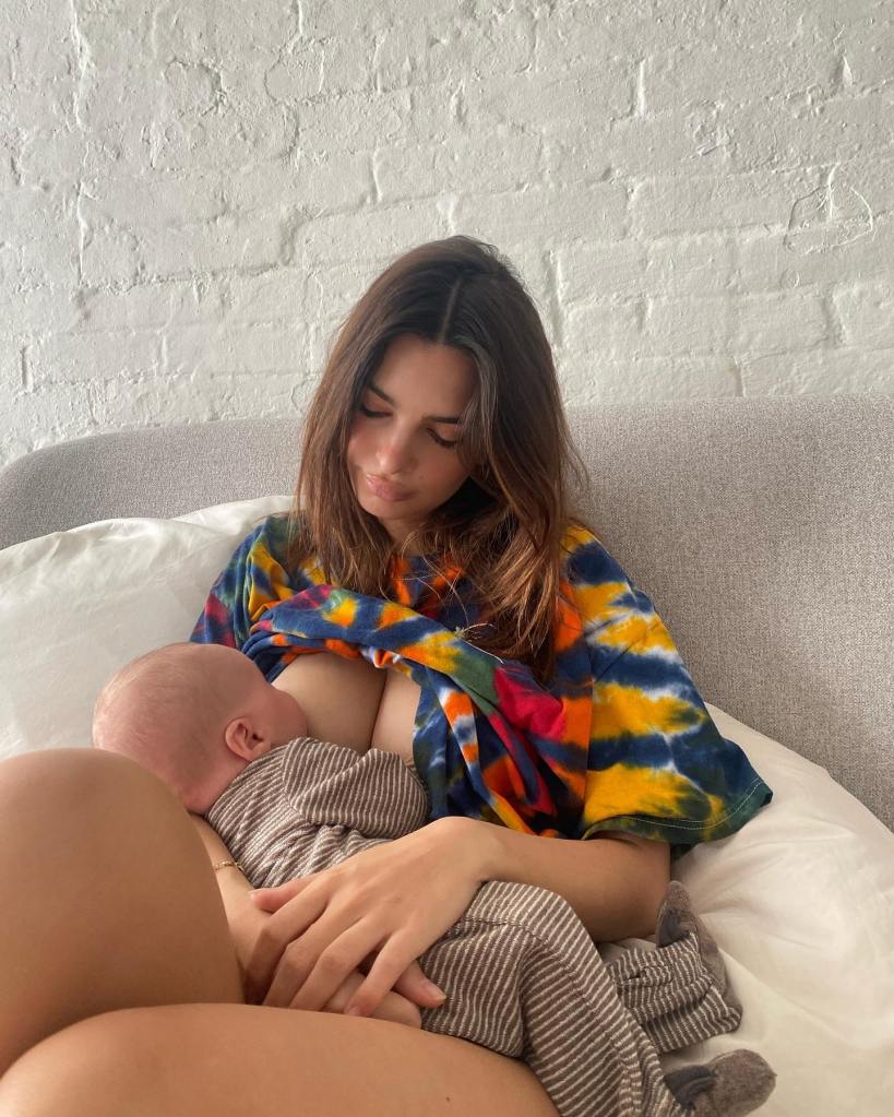 Emily Ratajkowski breastfeeds her son Sylvester in a snap from 2021.