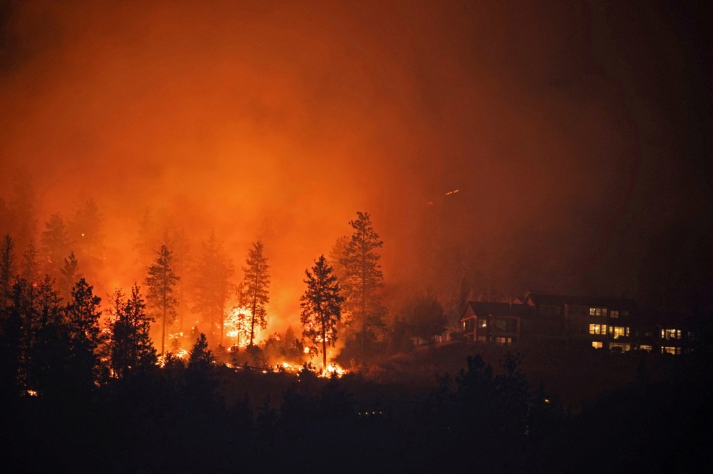 The fire is centered around Kelowna, a city some 180 miles east of Vancouver, with a population of about 150,000.