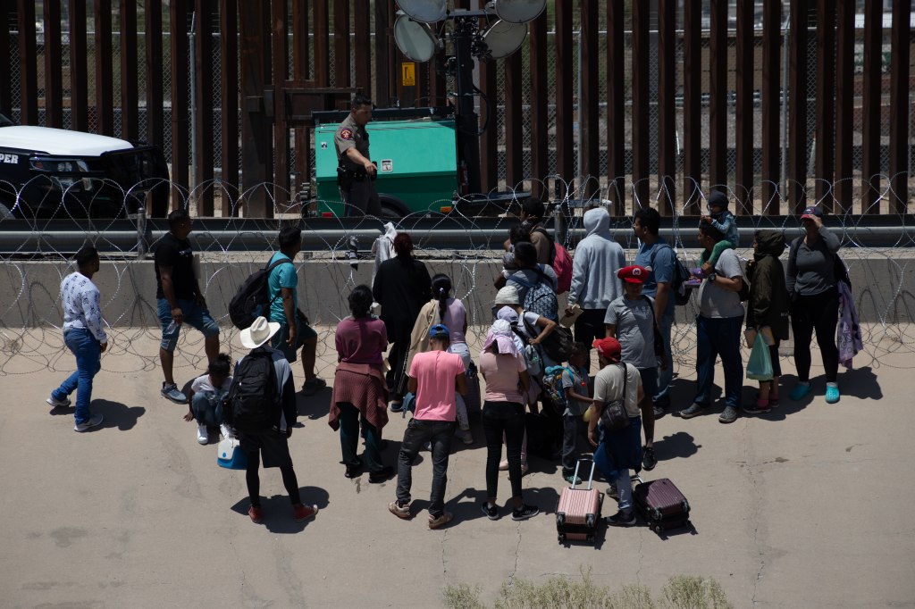 Migrants attempting to cross into the US illegally are met by border personnel.