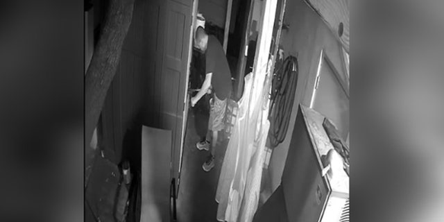 Male suspect breaking in