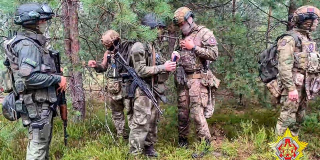 Belarus soldiers and Wagner forces