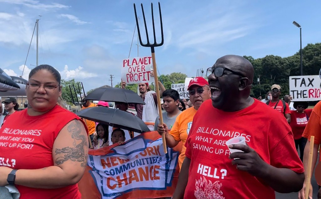 Climate activists protest on July 15, 2023, in East Hampton, New York. 