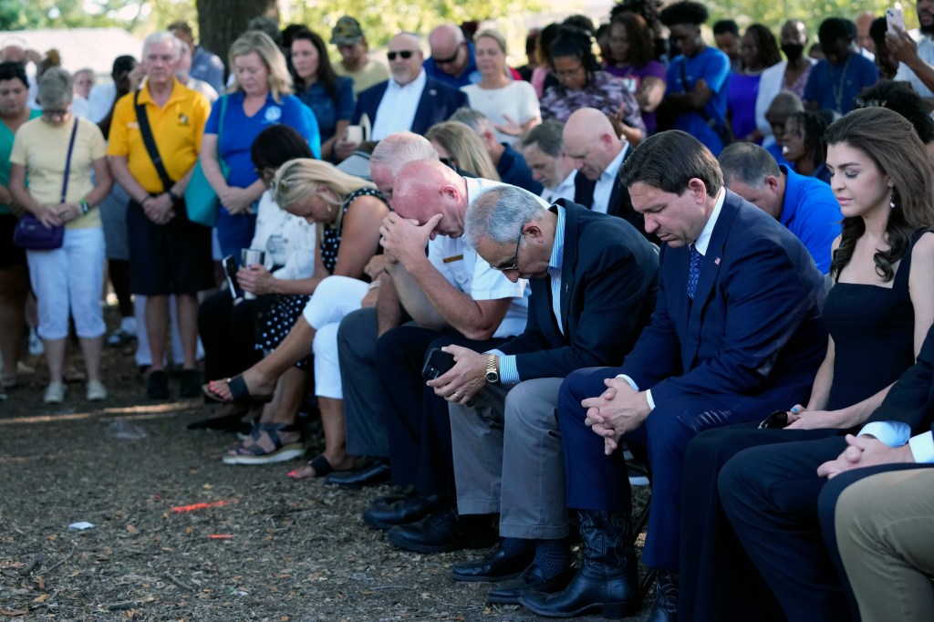 DeSantis was booed by the crowd at the vigil.