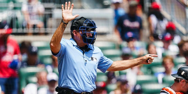 Angel Hernandez calls the game