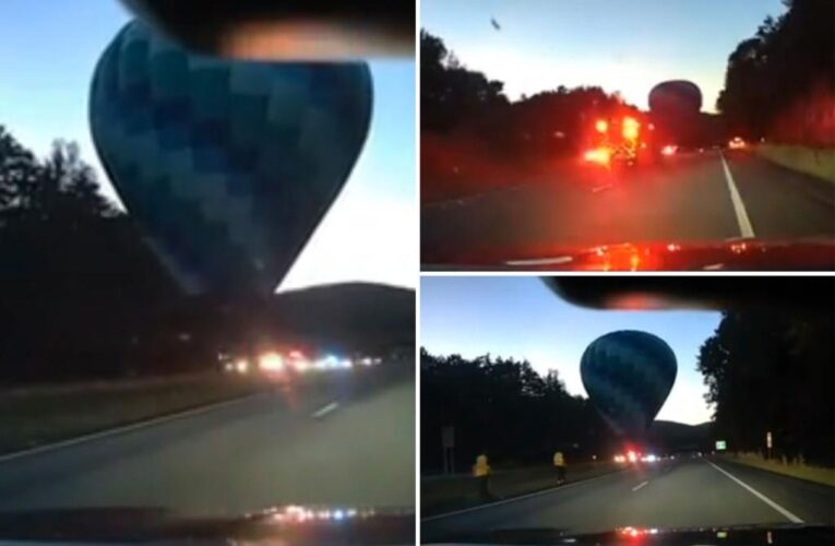 Hot air balloon pilot safely lands on Vermont highway median after mid-flight trouble with 4 passengers aboard