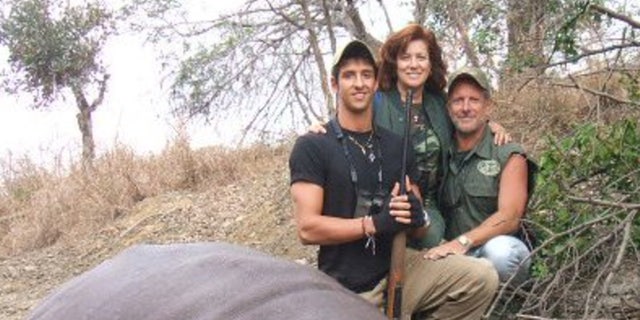 Bianca and Lawrence Rudolph with their son on a hunting trip