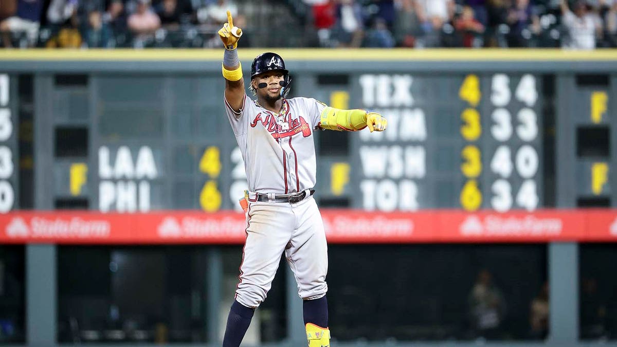 Ronald Acuna celebrates on second base