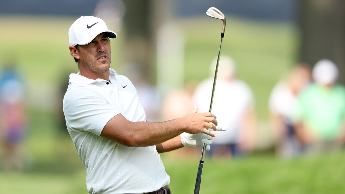 Brooks Koepka finishes swing