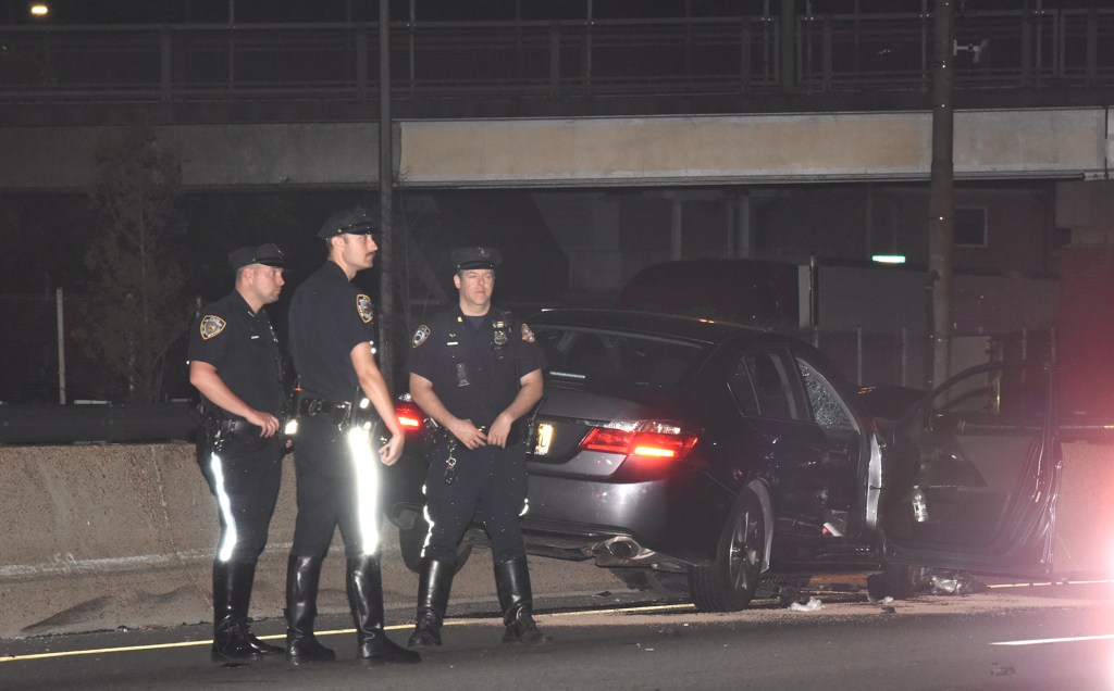 Officers arrive on the scene after a driver hit seven victims around 11:55 p.m. at West 36th Street and 6th Avenue on Aug. 20, 2023 in Manhattan. 