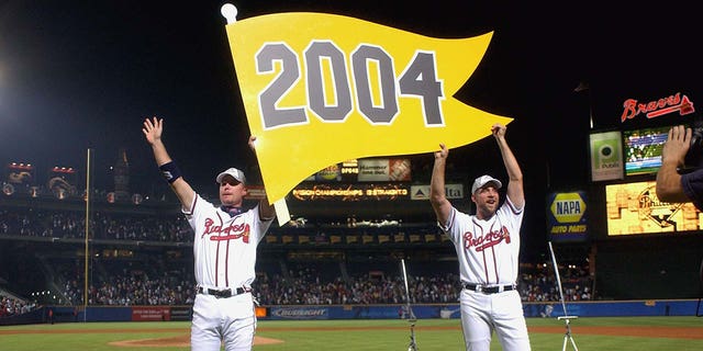 Chipper Jones and John Smoltz celebrate