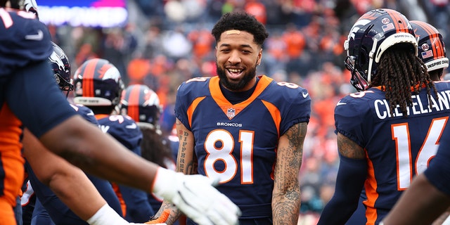 Tim Patrick greeted by Denver Broncos teammates