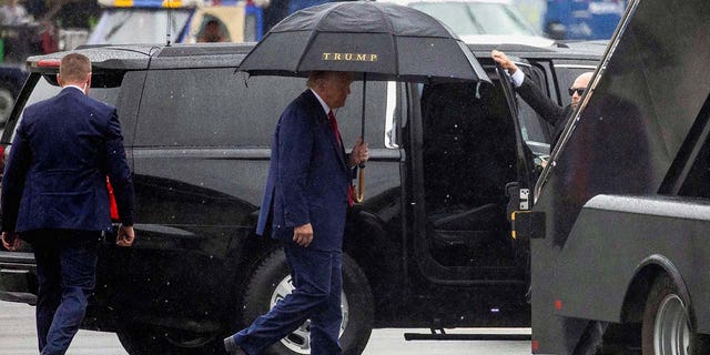 Donald Trump prepares to board his plane and depart Washington D.C.