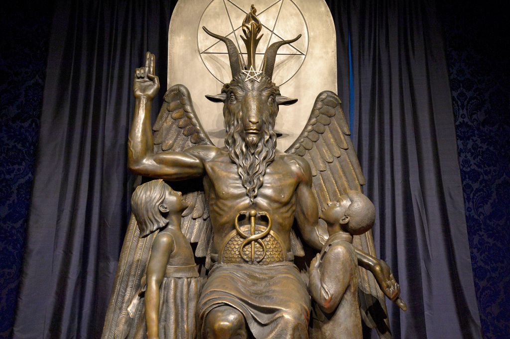 The Baphomet statue is seen in the conversion room at the Satanic Temple where a "Hell House" is being held in Salem, Massachusett on October 8, 2019.