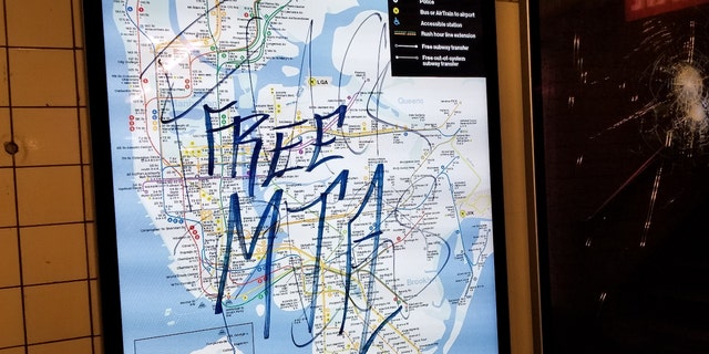 Graffiti on a map of New York City that reads, "Free MTA"