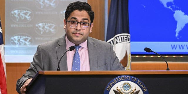 state department spokesperson deputy at podium