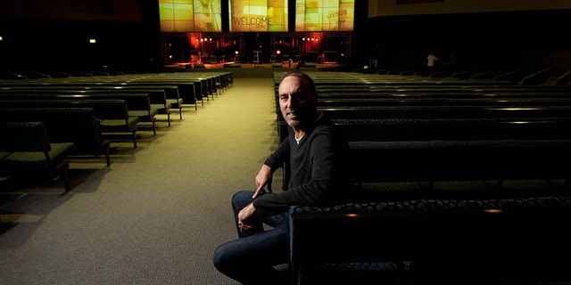 Brian Houston sitting