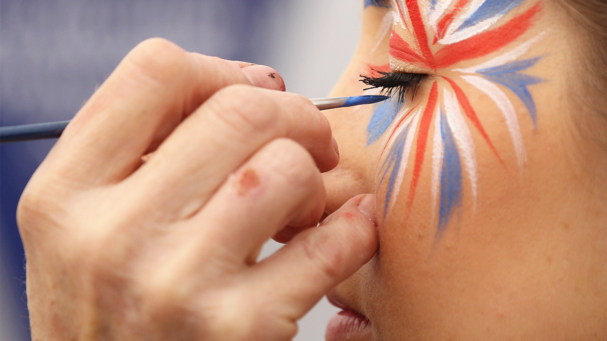 woman getting a face painting