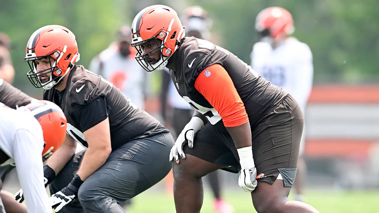 Tyrone Wheatley Jr runs a drill during OTAs