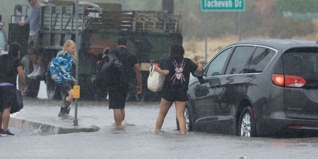 Motorists getting out of flood