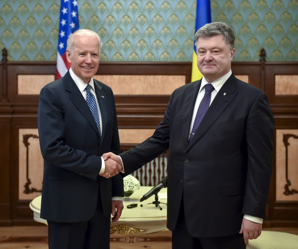 Biden shakes hands with Ukrainian President Petro Poroshenko (R) during his official visit in Kiev, Ukraine on December 7, 2015. 