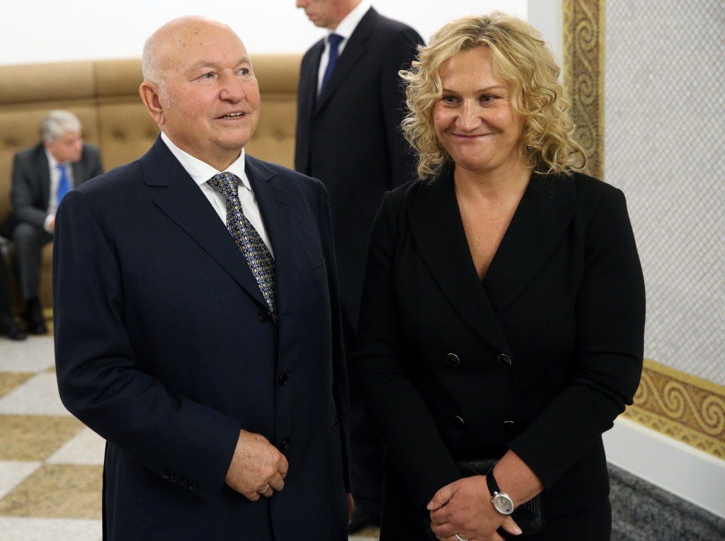 Former Moscow's Mayor Yuri Luzhkov (L) and his wife, businesswoman, billionaire Yelena Baturina (R) attend the state awarding ceremony at the Kremlin in Moscow, Russia, on September 22, 2016. 