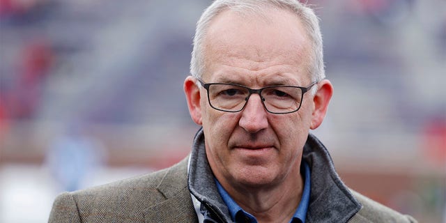 Greg Sankey attends a game