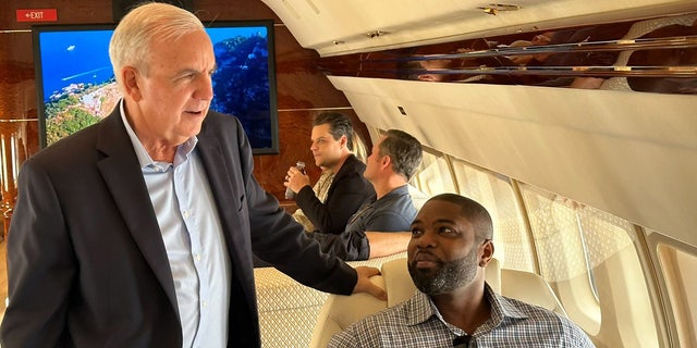 Rep. Carlos Gimenez on a plane to the Iowa State Fair