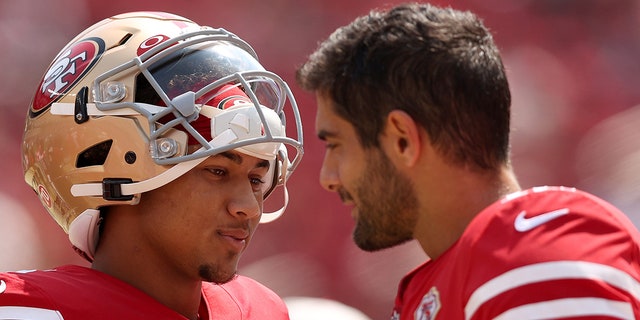 Jimmy Garoppolo and Trey Lance next to each other