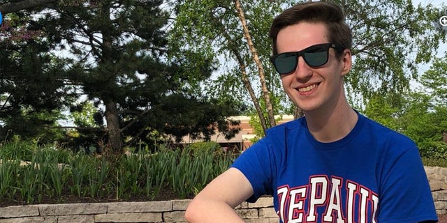 John Castic wears sunglasses and a DePaul Unversity T-shirt