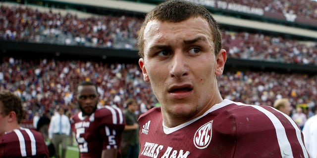 Johnny Manziel walks off the field