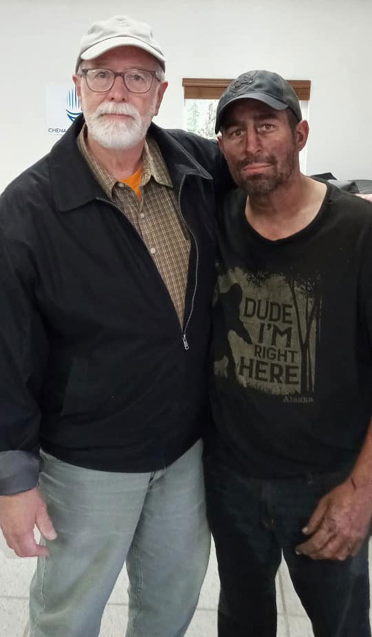 Jonas Bare is photographed alongside his dad after he was found.