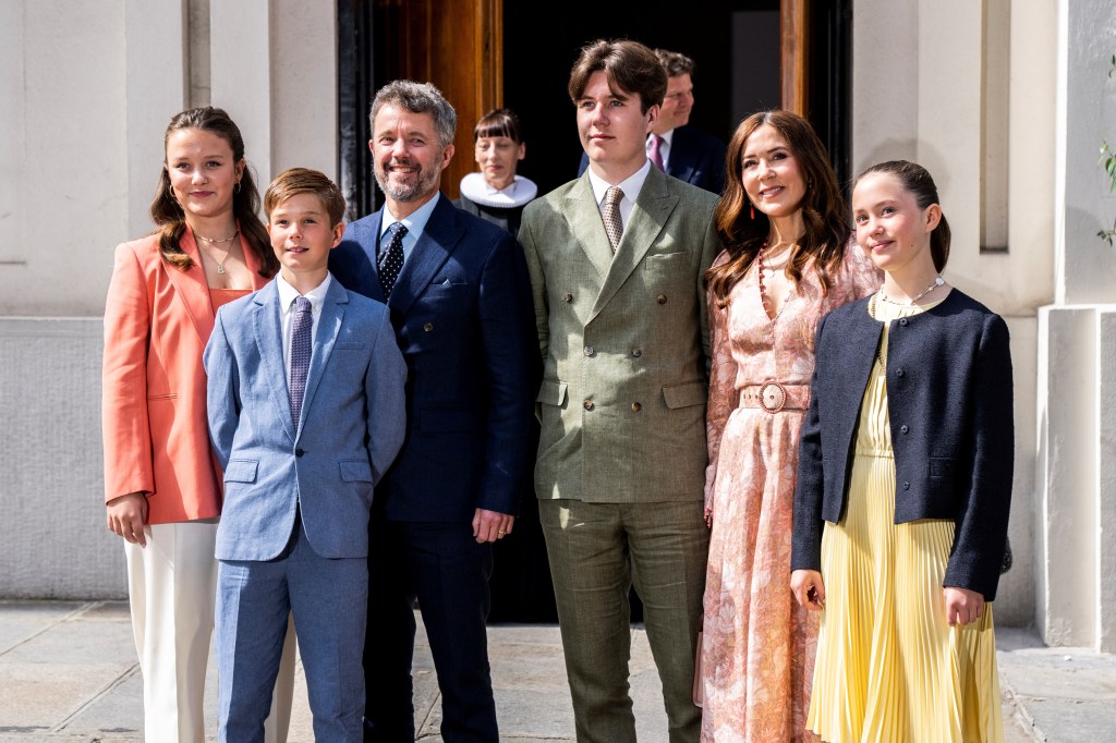 Crown Prince Henrik and his family outside a church