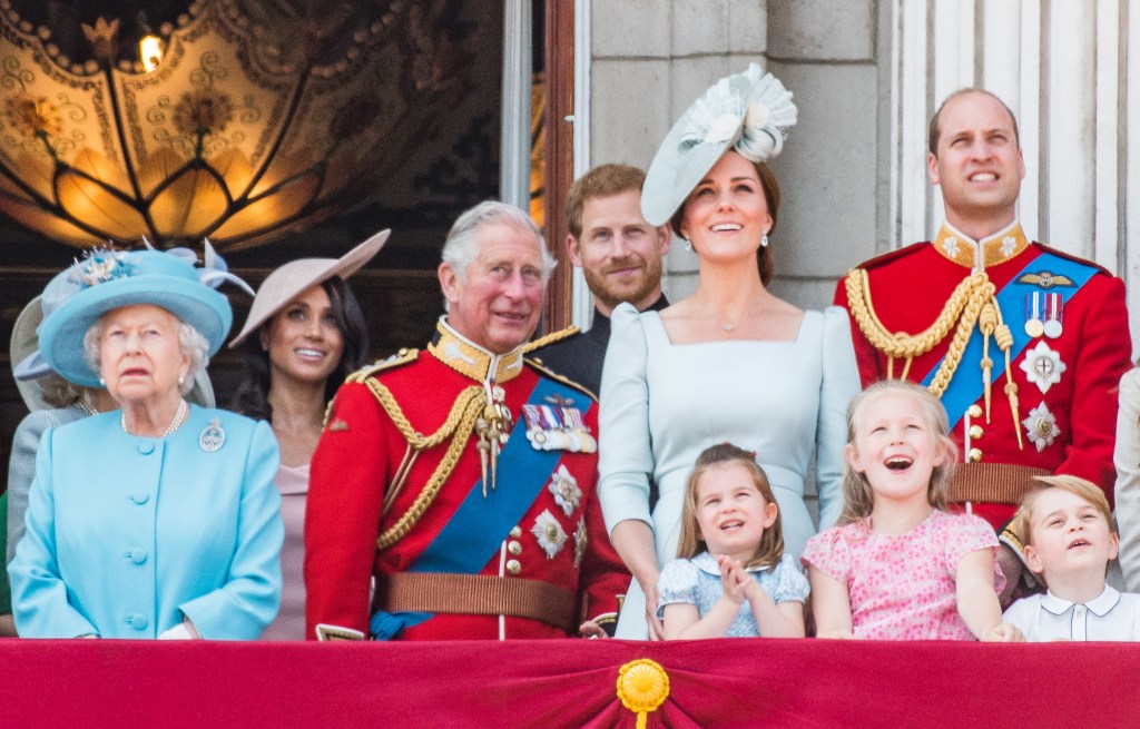 Members of the royal family standing with Queen Elizabeth II on the Buckingham Palace balcony.