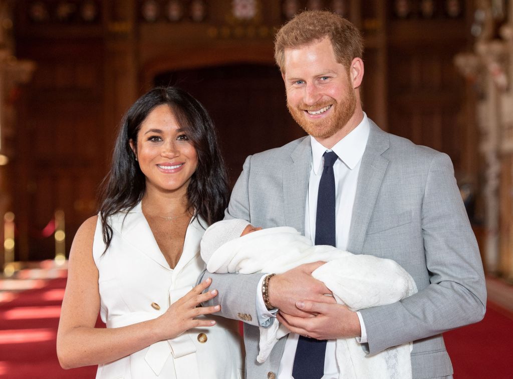 The Duke and Duchess of Sussex pose for a photo with Archie when he was a newborn on May 8, 2019, at Windsor Castle.