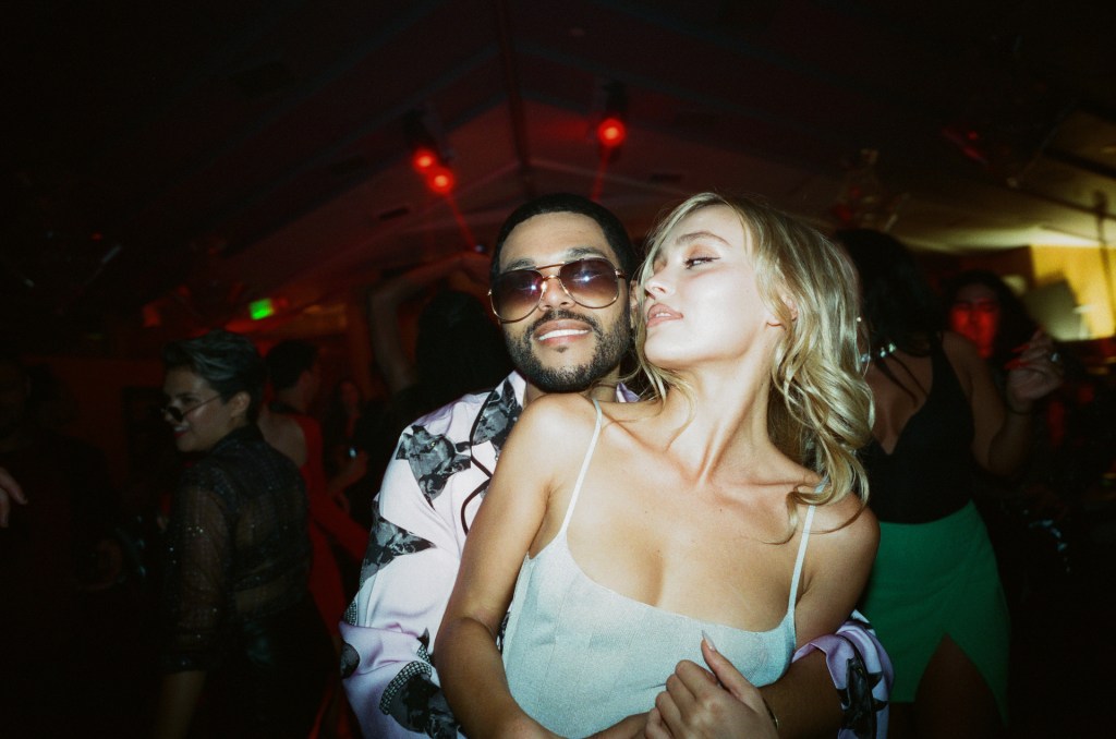 Photo of Lily Rose Depp and The Weeknd. 